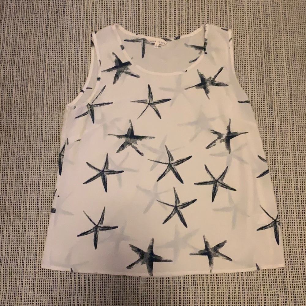 White sleeveless top with starfish. Size M